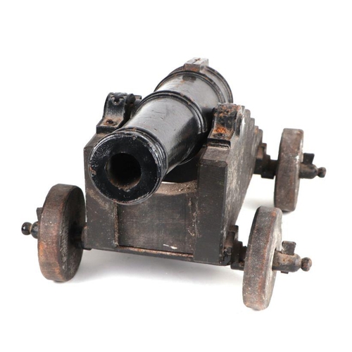 79 - A late 19th century signalling cannon. Having a cast iron barrel 49cms (19.25ins) long with an appro... 