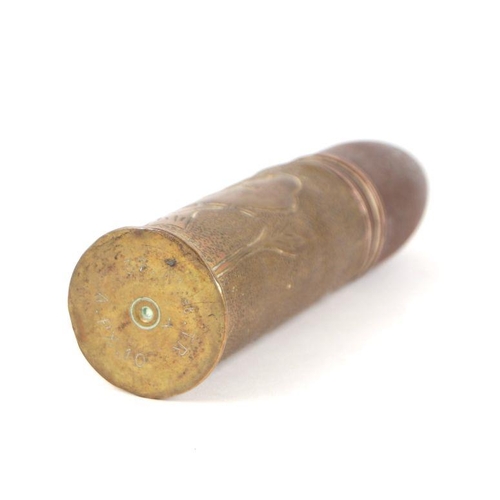 80 - A complete inert WW1 artillery shell and trench art brass casing in two parts. The shell casing deco... 