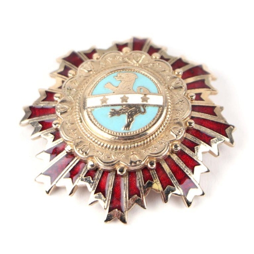 95 - An Eastern European white metal and enamel Military Order, 5cms diameter.