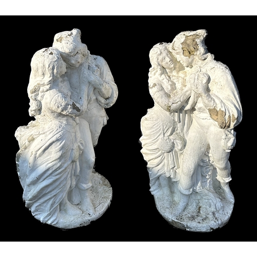 1 - A pair of reconstituted stone figural groups depicting courting couples, each approx 80cms high (2).