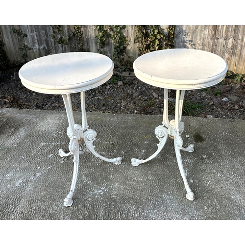 26 - A pair of Coalbrookdale style painted cast iron side tables, each with circular wooden tops, 45cms d... 