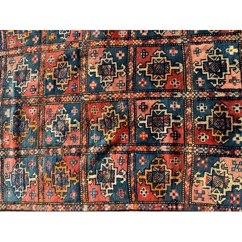 271 - A West Turkmenistan Tekke rug with a field of aina kochak guls, 164 by 244cms.