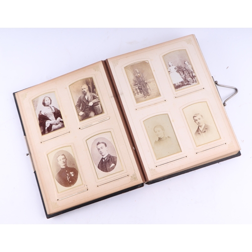 37 - Two Victorian leather photograph albums containing various Carte de Visite portraits and a selection... 