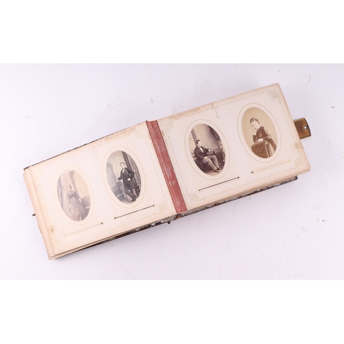 37 - Two Victorian leather photograph albums containing various Carte de Visite portraits and a selection... 