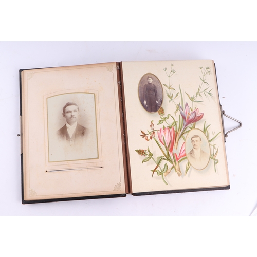 37 - Two Victorian leather photograph albums containing various Carte de Visite portraits and a selection... 