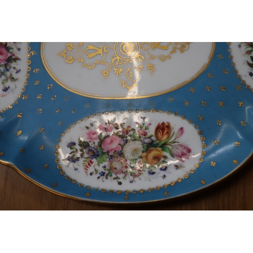 458 - A 19th century Sevres style Cabaret set decorated with flowers and gilt highlights, on a turquoise g... 