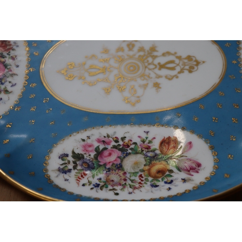 458 - A 19th century Sevres style Cabaret set decorated with flowers and gilt highlights, on a turquoise g... 