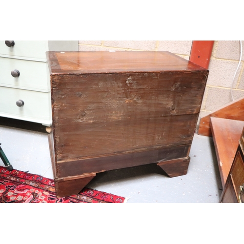 996 - A late 19th century George III style mahogany chest of drawers with an arrangement of four long draw... 