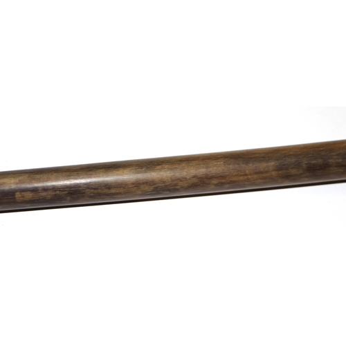 507 - A late 19th / early 20th century rhino horn walking cane. 86cm long. 367g