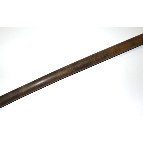 507 - A late 19th / early 20th century rhino horn walking cane. 86cm long. 367g