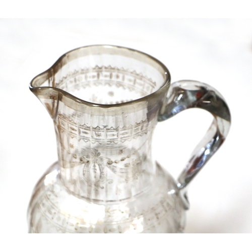 432 - A Georgian cut glass water jug, 19cms high; together with a Georgian water jug with gilded decoratio... 