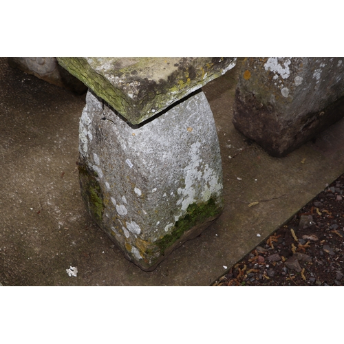 19 - A staddle stone with associated square top, 67cms high.