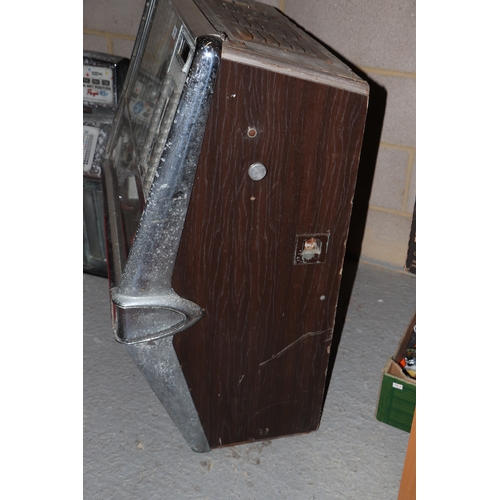 256 - A 1960's Rock-Ola Princess Juke Box, for restoration, 70cms wide; together with a selection 45rpm re... 