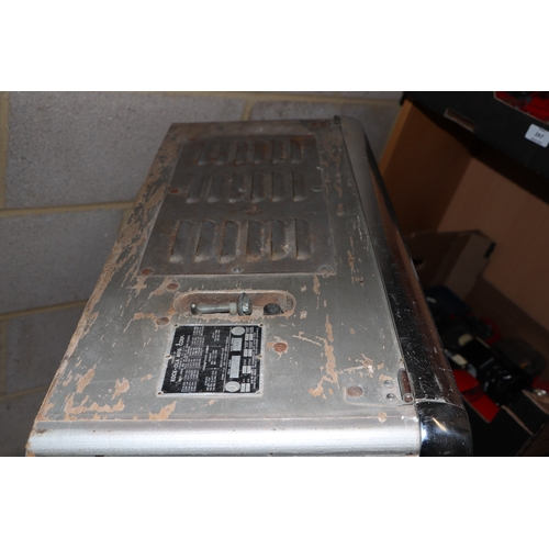 256 - A 1960's Rock-Ola Princess Juke Box, for restoration, 70cms wide; together with a selection 45rpm re... 