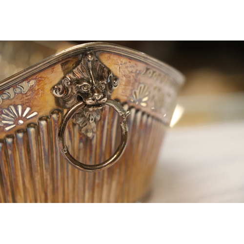 571 - A Victorian pierced silver bread basket with lion mask loop handles, Sheffield 1899 and maker's mark... 