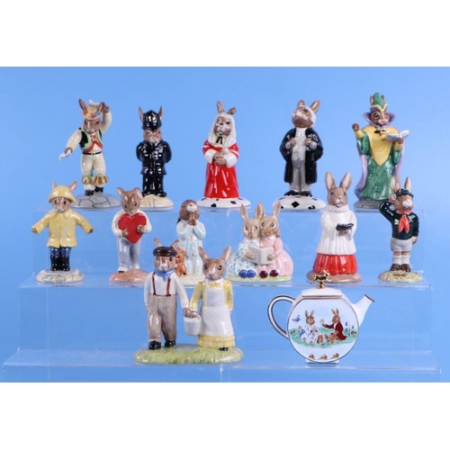 330 - A quantity of Royal Doulton Bunnykins figures to include Rainy Day, Morris Dancer, Bed Time and Stor... 