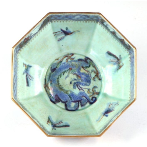 345 - A Wedgwood Dragon lustre bowl of octagonal form, 20cms wide.