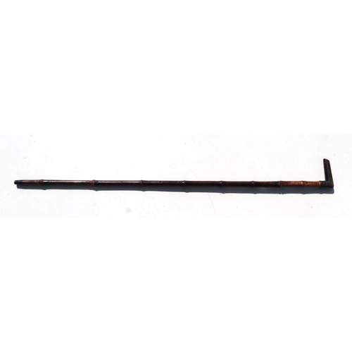 35 - A bamboo sword stick with triangular tapering steel blade, overall 96cms long, blade length 78cms.