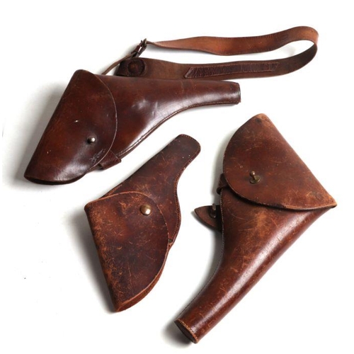 38 - Three leather gun holsters (3).