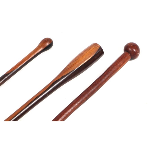 389 - Three African hardwood walking sticks (possibly lignum vitae), the largest 92cms long (3).