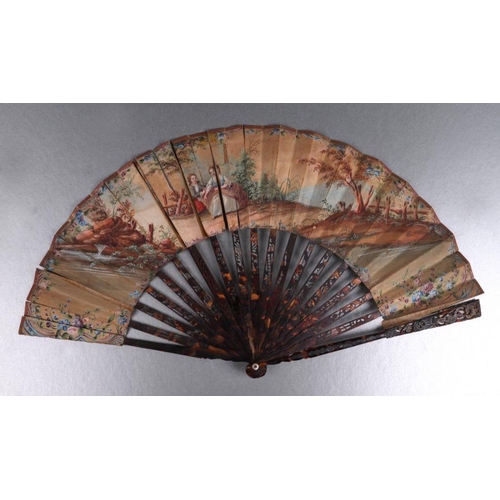 431 - A mid 18th century tortoiseshell fan, hand painted with figures within a landscape; together with a ... 