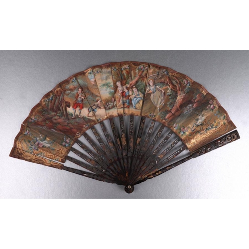 431 - A mid 18th century tortoiseshell fan, hand painted with figures within a landscape; together with a ... 