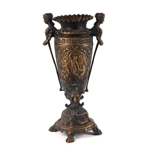 440 - A classical cast bronze urn with mask handles, grotesque supports and quatrefoil circular base, 38cm... 