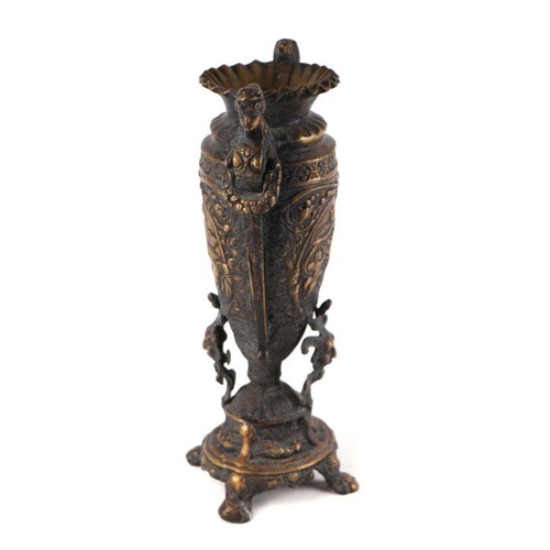 440 - A classical cast bronze urn with mask handles, grotesque supports and quatrefoil circular base, 38cm... 