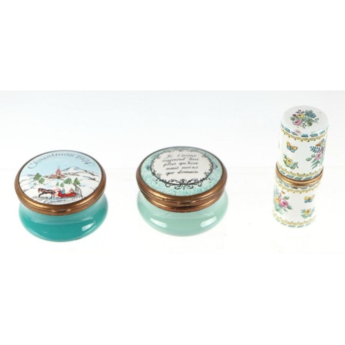 443 - A large collection of Halcyon Days enamel boxes to include Christmas boxes, egg shaped boxes and ann... 