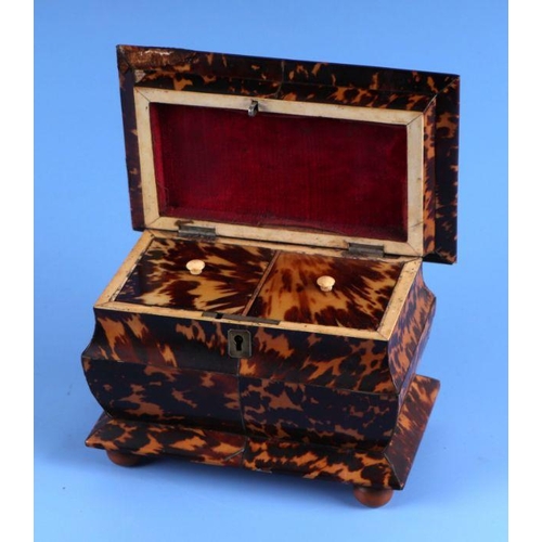 444 - A Regency tortoiseshell tea caddy with silver stringing, two-division department and bun feet, 17cms... 