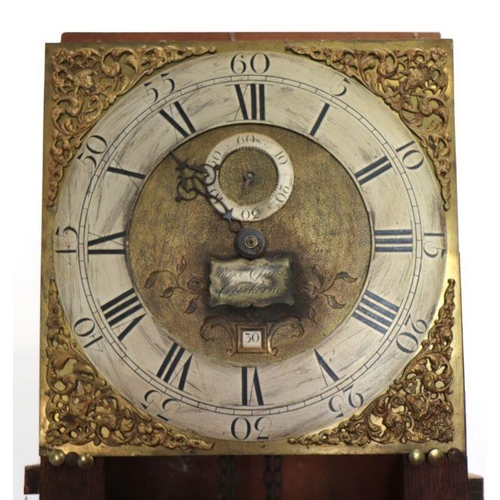 457 - An oak cased longcase clock, the 30cms square brass dial with silvered chapter ring, Roman and Arabi... 