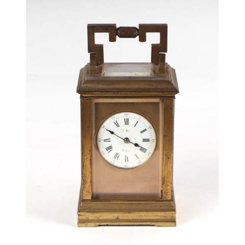 459 - A late 19th century French brass four-pillar carriage clock, the white dial with Roman and Arabic nu... 