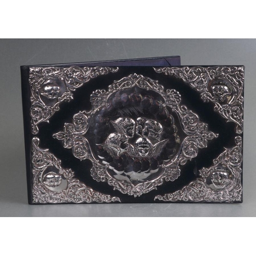 487 - A Victorian style silver mounted leather desk blotter, London 1990.