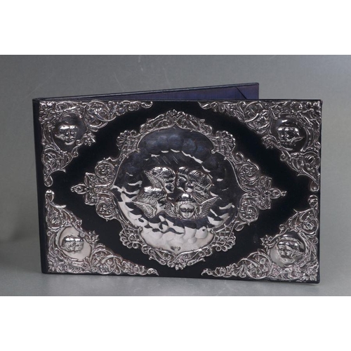 487 - A Victorian style silver mounted leather desk blotter, London 1990.