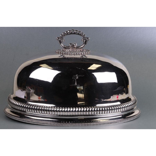 488 - A silver plated meat dome with family crest, 36cms wide.