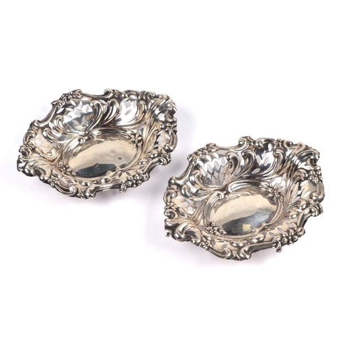 516 - A pair of Victorian pierced silver bonbon dishes, Birmingham 1896, 12cms wide, 53g.