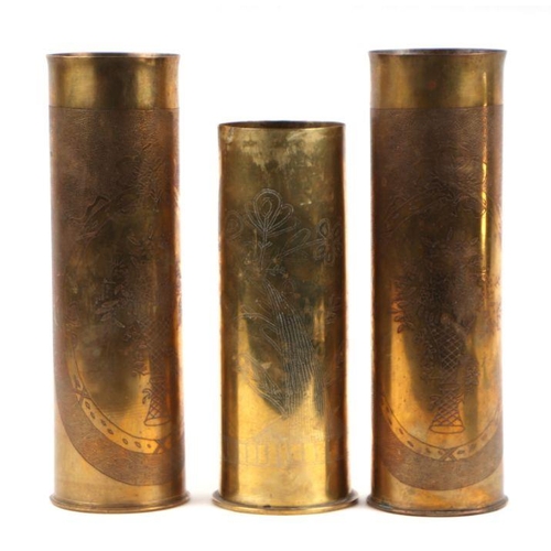 89 - A matching pair of 1918 dated trench art brass shell cases inscribed with vases of flowers 27cms (10... 