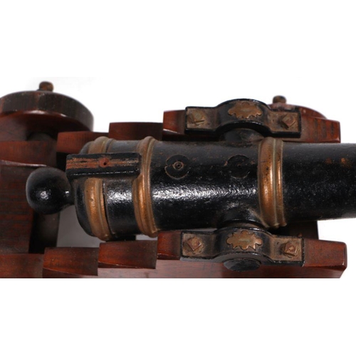 97 - A late 19th century signal cannon. Having a cast iron barrel 49cms (19.25ins) long with an approxima... 