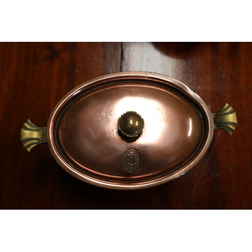 394 - A Victorian copper jelly mould, 23cms diameter; together with a copper pan and cover, 17cms wide; an... 