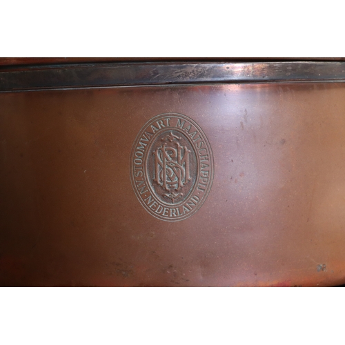 394 - A Victorian copper jelly mould, 23cms diameter; together with a copper pan and cover, 17cms wide; an... 