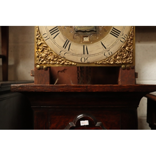 457 - An oak cased longcase clock, the 30cms square brass dial with silvered chapter ring, Roman and Arabi... 