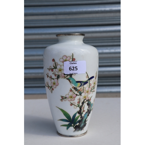 625 - A Japanese cloisonne vase decorated with a bird and flowering cherry tree, on a white ground, 19cms ... 