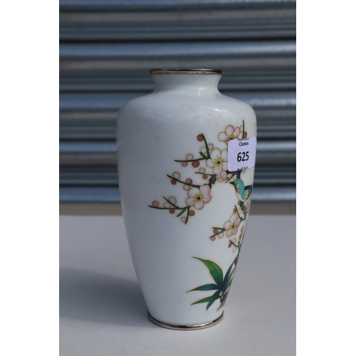 625 - A Japanese cloisonne vase decorated with a bird and flowering cherry tree, on a white ground, 19cms ... 