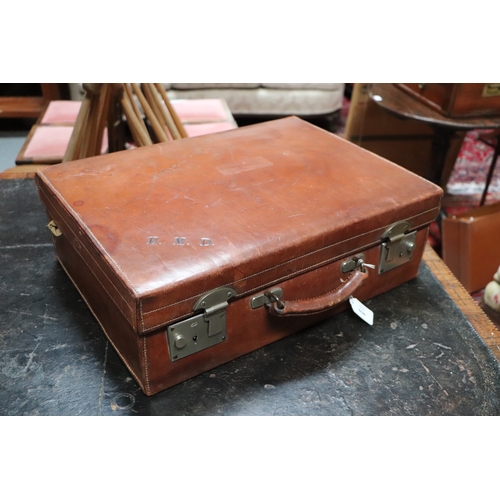 408 - Two vintage brown leather suitcase, the largest 50cms wide (2).