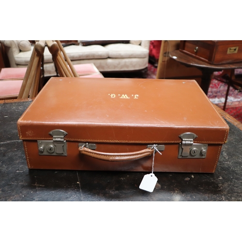 408 - Two vintage brown leather suitcase, the largest 50cms wide (2).