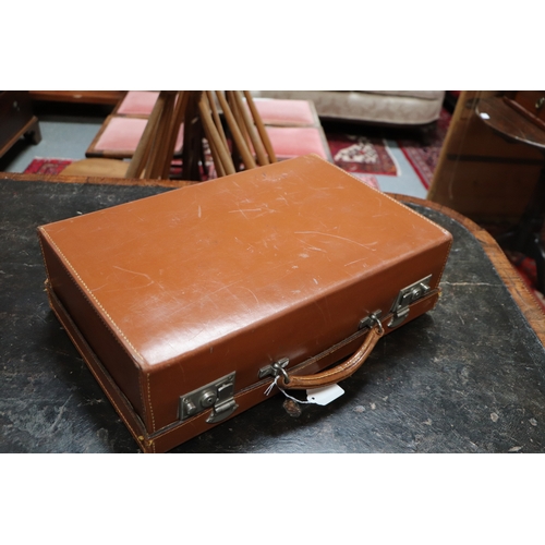 408 - Two vintage brown leather suitcase, the largest 50cms wide (2).