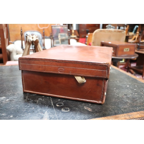 408 - Two vintage brown leather suitcase, the largest 50cms wide (2).