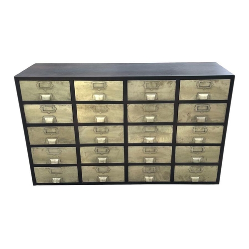 1055 - An industrial style mid-century bank of twenty drawers, 133cms wide.