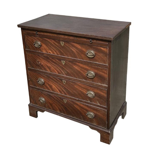 1060 - A 19th century mahogany chest of drawers with brushing slide above three graduated long drawers, on ... 