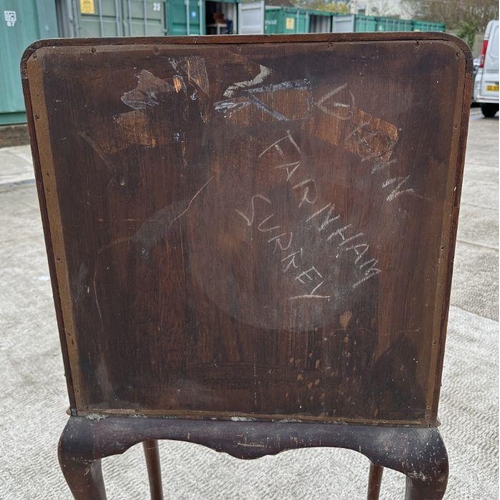 1061 - An early 20th century Queen Anne style mahogany drinks cabinet on stand, the pair of panelled doors ... 